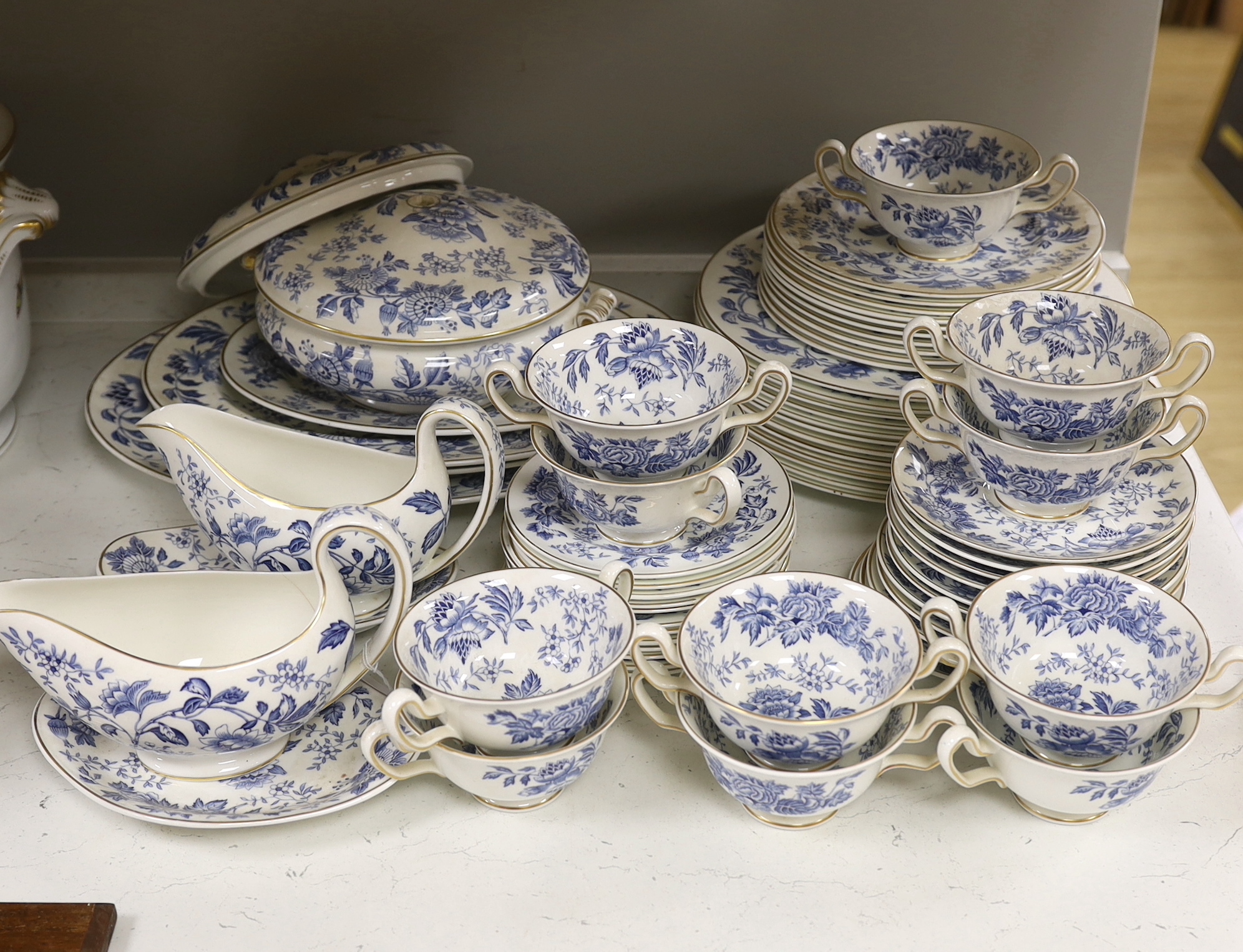 A Wedgwood bone china blue and white dinner service including oval platters, sauce boats and a tureen